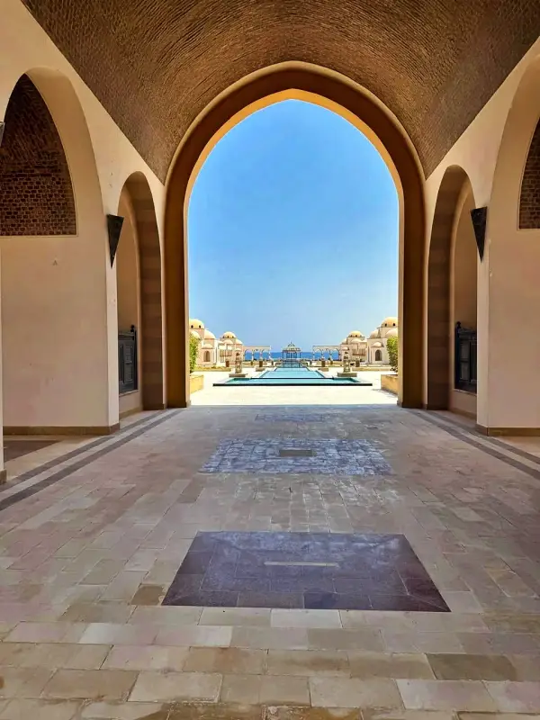 An arched passage opening onto the bay