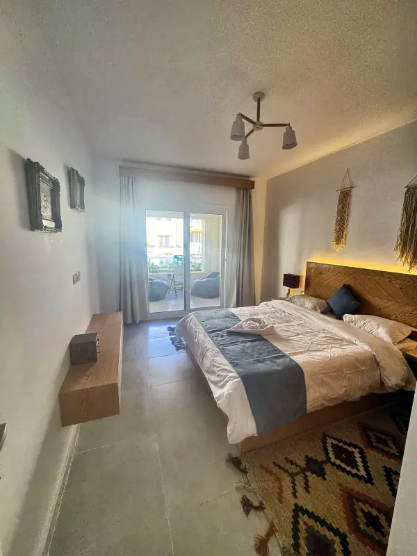 Bedroom with light from the balcony door