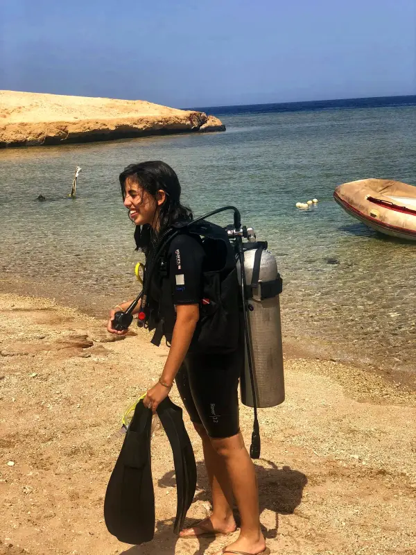 A diver heading out from the beach