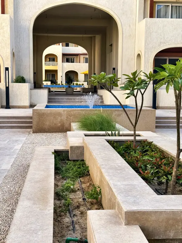 Planted courtyard beneath the arcade