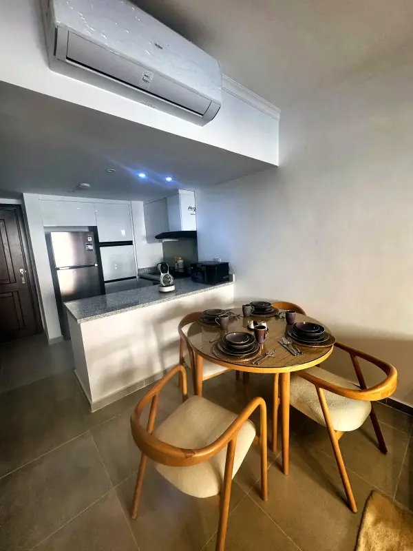 Fully equipped kitchen beside the dining table