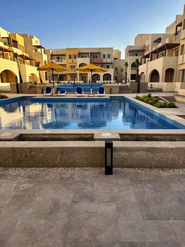 The pool courtyard between the residence buildings