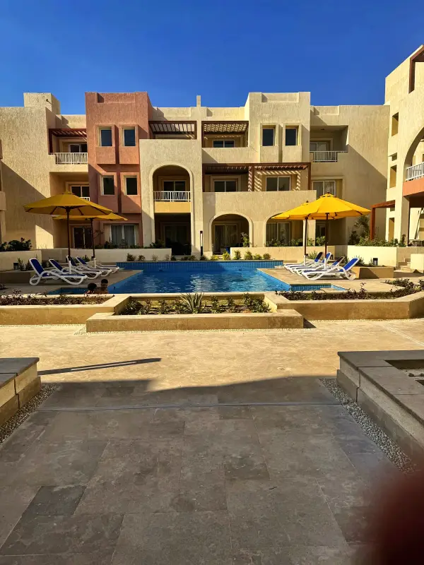 Sun terrace and loungers beside the pool