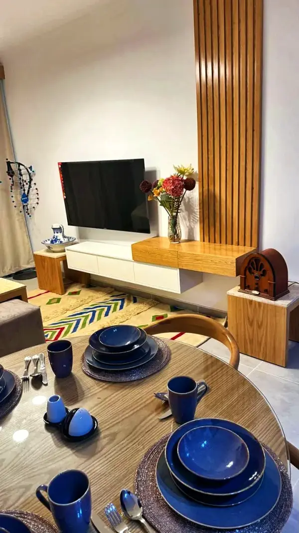 A dining table set with blue crockery