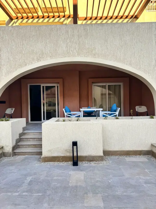 Steps up to a ground-floor terrace